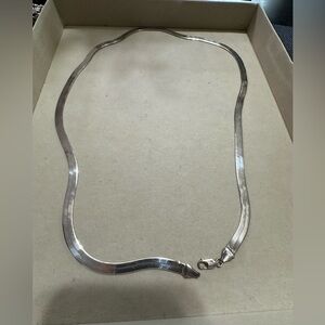 Sterling silver 30” solid herringbone chain necklace.